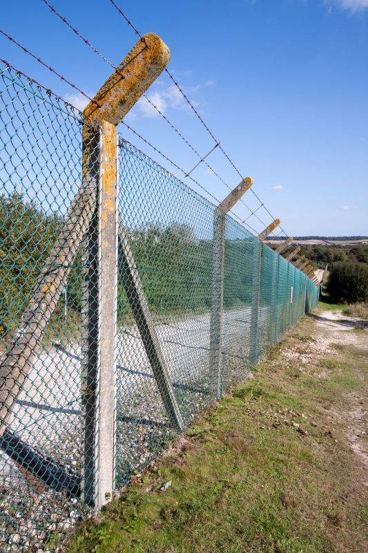 Barbed Wire Fence Installation