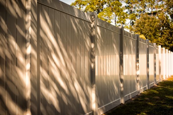 Tan Vinyl Fence Installation in Akron